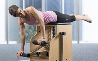 Physiotherapist guiding a patient through physiotherapy exercises